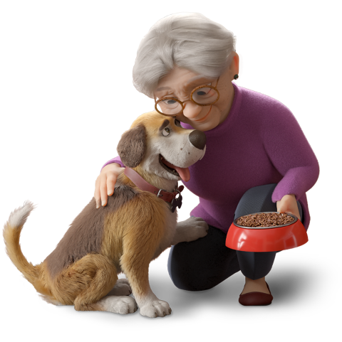 Une femme âgée nourrit son chien